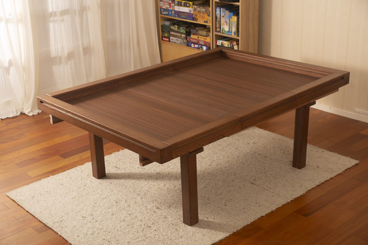Extended table with the vault open